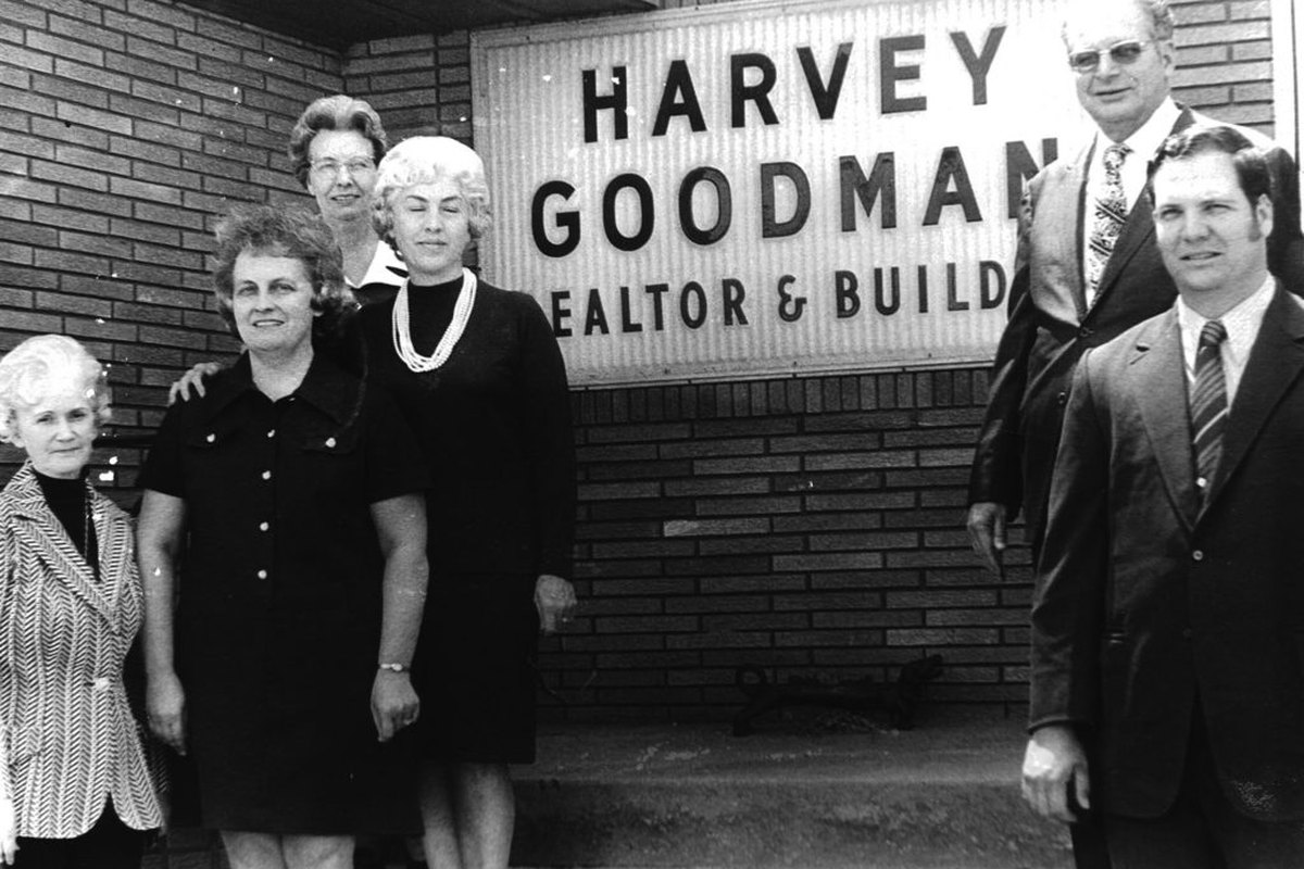 The Goodman family in front of their original real estate office
